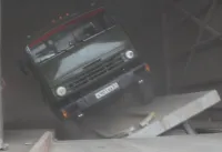 Автомобилеразгрузчик на весах